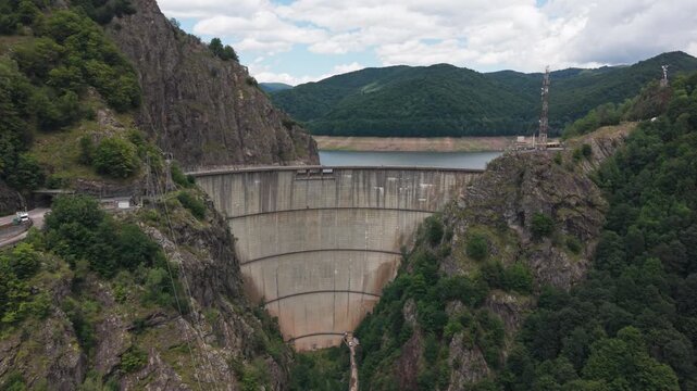 Vidraru Arch Dam Below Forested Peaks