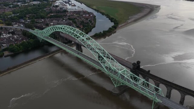 Aerial view of the silver jubilee bridge spanning the river mersey