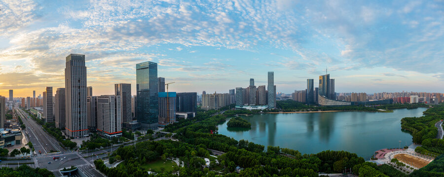 Sunrise scenery of Swan Lake and the CBD business district skyline in Hefei, China.