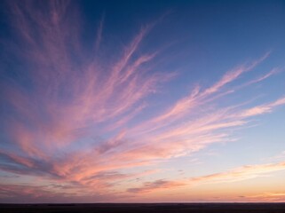 Fototapeta premium Pink Lavender Clouds At Sunset Sky