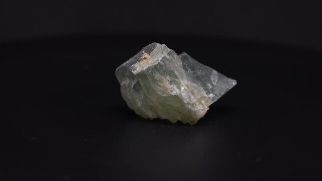 green beryl mineral from Brazil with black background