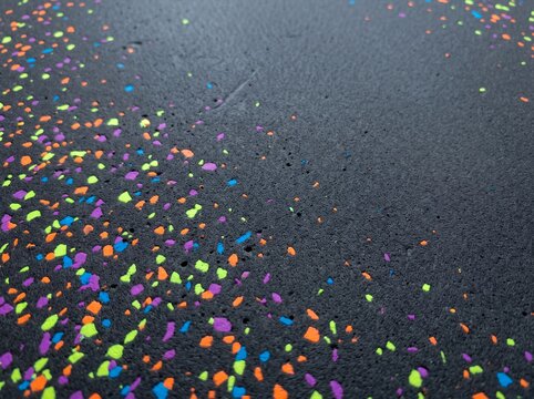 Recycled EVA Foam Surface with Energetic Neon Speckles
