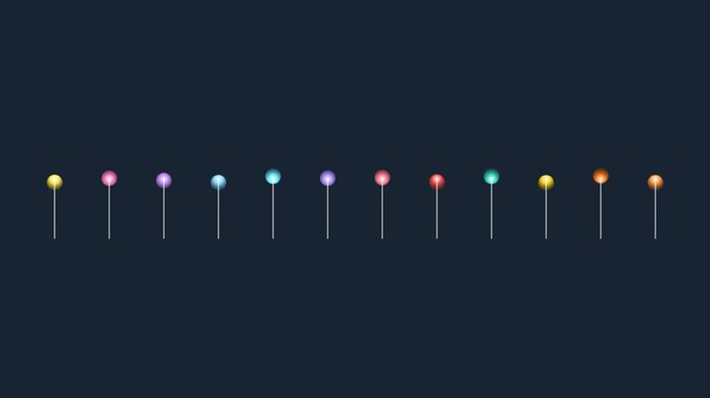 Set of colorful push pins arranged in a horizontal row on a dark background for office and organization concepts and map markers for planning and travel location tracking projects 4K Motion Video