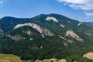 Obraz premium Landscape of alp mountain and forest lake. Nature landscape. Lake in scenic alp nature. Scenic nature alp hiking lake. Mountain green forest. Alpine peaks. Lake with mountain landscape