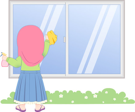 A young Muslim woman in a hijab cleaning a large glass window with a spray bottle and cloth outside