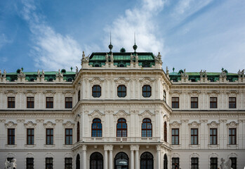 Fototapeta premium Historic baroque building architecture. Palace classic architectural design. Historical landmark. Architectural building looks like royal palace in baroque style. Touristic architecture
