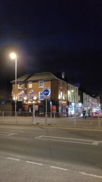 July 3rd, 2026. Illuminated Streets View of Luton City of England United Kingdom After Sunset Night. Wide Angle Camera Footage Was Captured During Walk at Night.