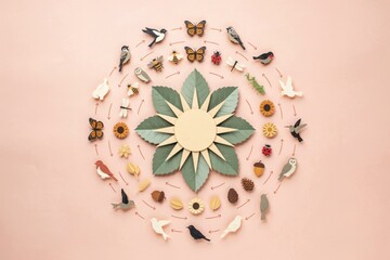 Naklejka premium Circular Ecosystem Diagram and Biodiversity Food Web with Nature Symbols and Wildlife on Pink Background