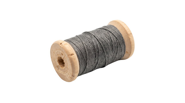Vintage wooden spool with grey thread, antique sewing bobbin for tailoring, rustic needlework supply on white background