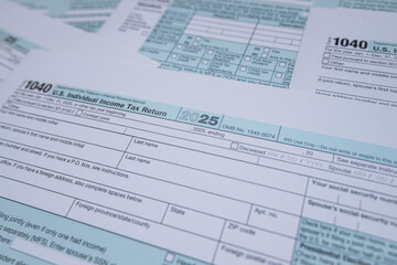 Fototapeta premium US Individual Income Tax Return Form 1040 Blank Documents for Annual Filing and Accounting Concept