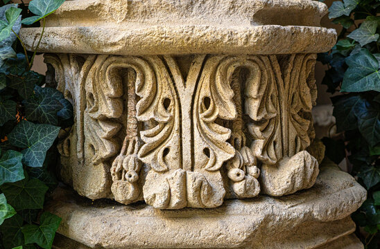Carved stone architectural column base with acanthus ornament