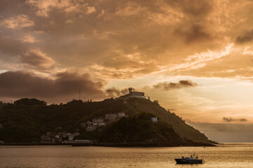 Fototapeta premium Golden Sunset over La Concha Bay and Beach in San Sebastian, Basque Country, Spain
