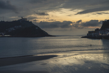 Fototapeta premium Golden Sunset over La Concha Bay and Beach in San Sebastian, Basque Country, Spain