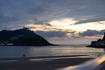 Fototapeta premium Golden Sunset over La Concha Bay and Beach in San Sebastian, Basque Country, Spain