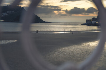 Fototapeta premium Golden Sunset over La Concha Bay and Beach in San Sebastian, Basque Country, Spain