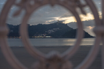 Fototapeta premium Golden Sunset over La Concha Bay and Beach in San Sebastian, Basque Country, Spain