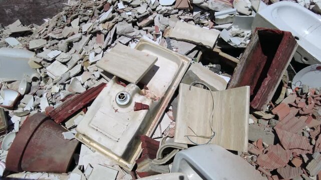 Europe, Italy, Milan: municipal sorted waste collection in Recycling and Waste Drop-off Center&mdash;RAE and household waste (glass, plastic, appliances, iron, paper, wood) separated for recycling at an Ams