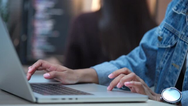 Office Worker Using Laptop for Daily Business Tasks