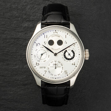 IWC Portugieser Perpetual Calendar watch in platinum features a silver-plated dial with a double moon phase display. Milan, Italy, November 9, 2023