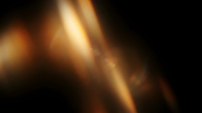 Golden light ray streaks overlay on black background