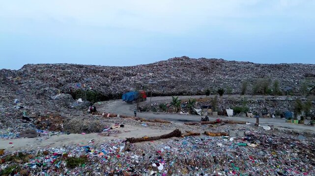Large municipal landfill illustrating the scale of urban waste disposal in Medan, Indonesia, aerial