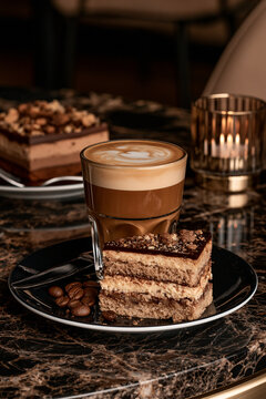 cup of coffee with chocolate dessert