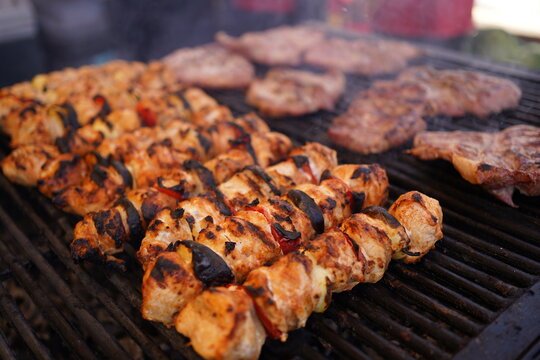 Close-Up of Grilled Chicken Skewers at a Street Festival in Sighisoara, Romania