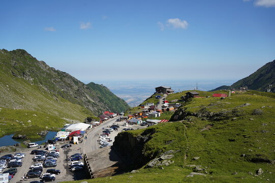 Crowded parking lot at Balea Lake on the Transfagarasan Highway in Romania