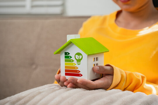 Home improvement concepts, home energy efficiency, eco-friendly home improvements, cost savings and green energy costs, green buildings for sustainable development.