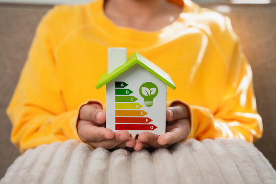 Home improvement concepts, home energy efficiency, eco-friendly home improvements, cost savings and green energy costs, green buildings for sustainable development.