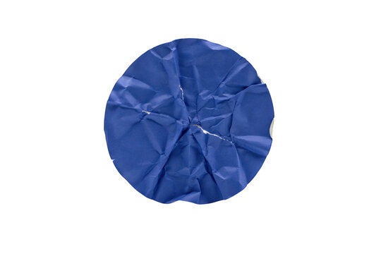 A circular piece of vibrant blue paper that has been crumpled into a textured, uneven shape, isolated on a solid black background, supply