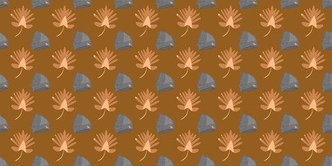 Fototapeta premium Repeat pattern of gray winter beanies with orange star patches and stylized brown leaves on a warm brown background