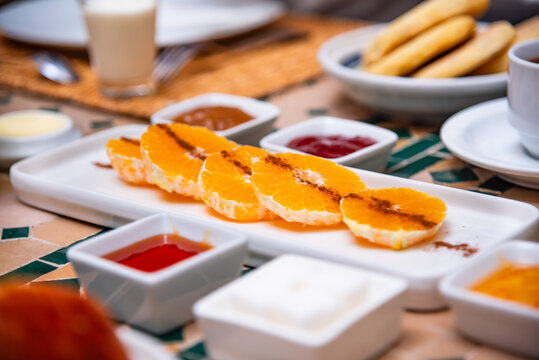 Traditional breakfast in Morocco with oranges and arabic bread