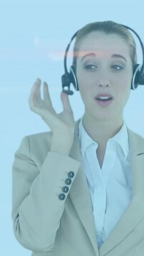 Animation of shapes over caucasian businesswoman using phone headset