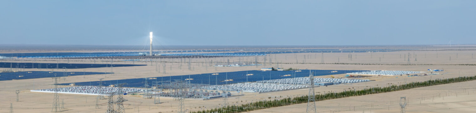 Large-Scale Battery Energy Storage Power Station, Glowing Solar Thermal Tower and Photovoltaic Arrays across Gobi Desert