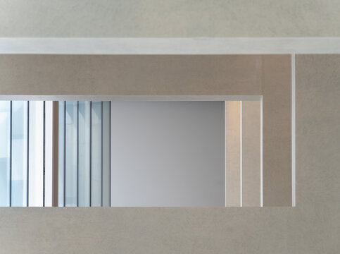Minimalist Geometric Interior with Layered Architectural Frames and Windows