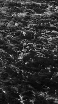 A serene black and white  of calm water