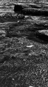 A black and white  of ocean waves