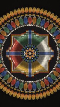 Tibetan sand mandala with rolling waves of colored powder, seamless loop, vertical