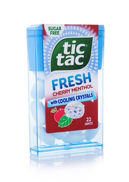 LONDON,UK - SEPTEMBER 20,2025: Tic Tac Fresh cherry menthol drage candies with cooling crystals on white background.