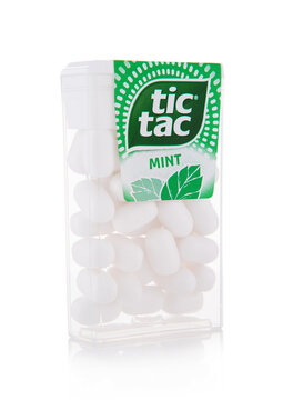 LONDON,UK - SEPTEMBER 10,2025: Tic Tac Fresh original mint drage candies in original plastic container on white background.