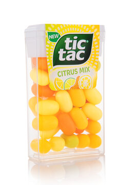 LONDON,UK - SEPTEMBER 20,2025: Tic Tac citrus mix flavour drage candies in on white background. Lemon and Lime.