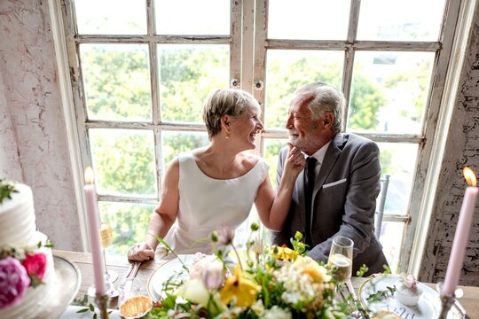 Joyful elderly couple wedding celebration