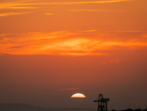 Orange sunset over Ploce harbor and Adriatic coast