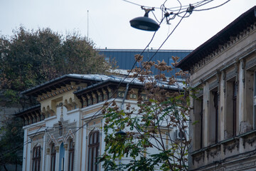 Historic European Building Facade with Street Lamp in Bucharest © Maria Sap
