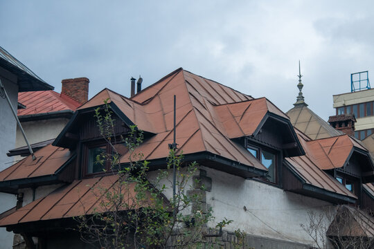 Rustic Roof with Dormer Windows and Copper Sheet Metal in Sinaia