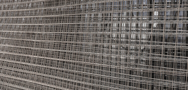 Reinforcing mesh sheets for concrete building foundation