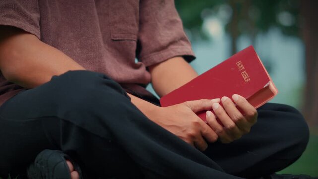 man reading Bible