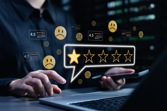 Negative customer review, online feedback concept. Woman using smartphone to leave one star review, with sad face emojis and rating icons. customer feedback, online reviews, consumer dissatisfaction,