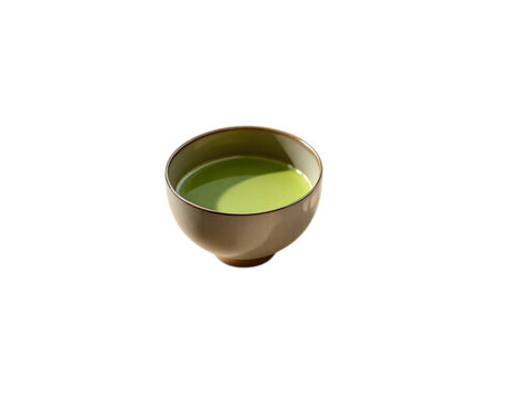 Beautiful ceramic bowl filled with light green tea liquid transparent background